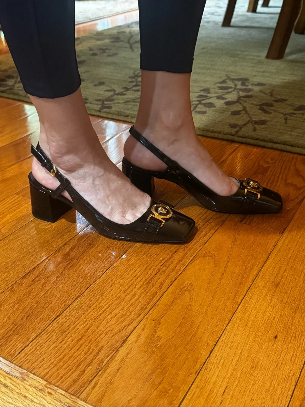 Versace Black Patent Slingback Pumps with Gold Medallion Detail